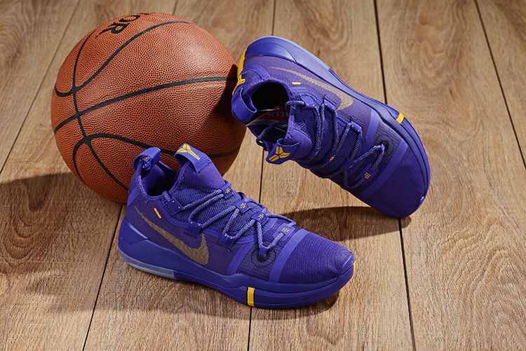 blue and yellow kobe shoes
